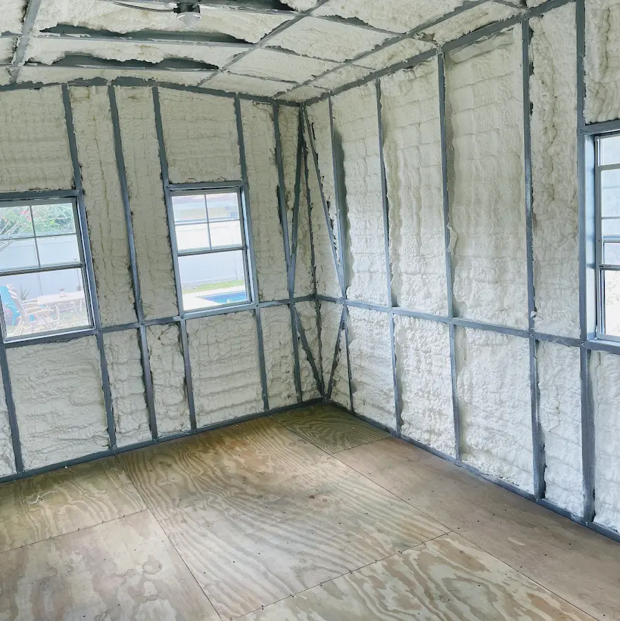 Closed-cell spray foam insulation applied to wall cavities in a residential project in Ann Arbor